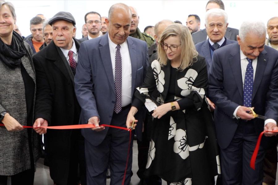 Cutting the ribbon at the Hebron Courthouse